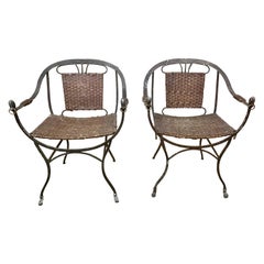 Pair of Iron Horseshoe Back and Leather Chairs
