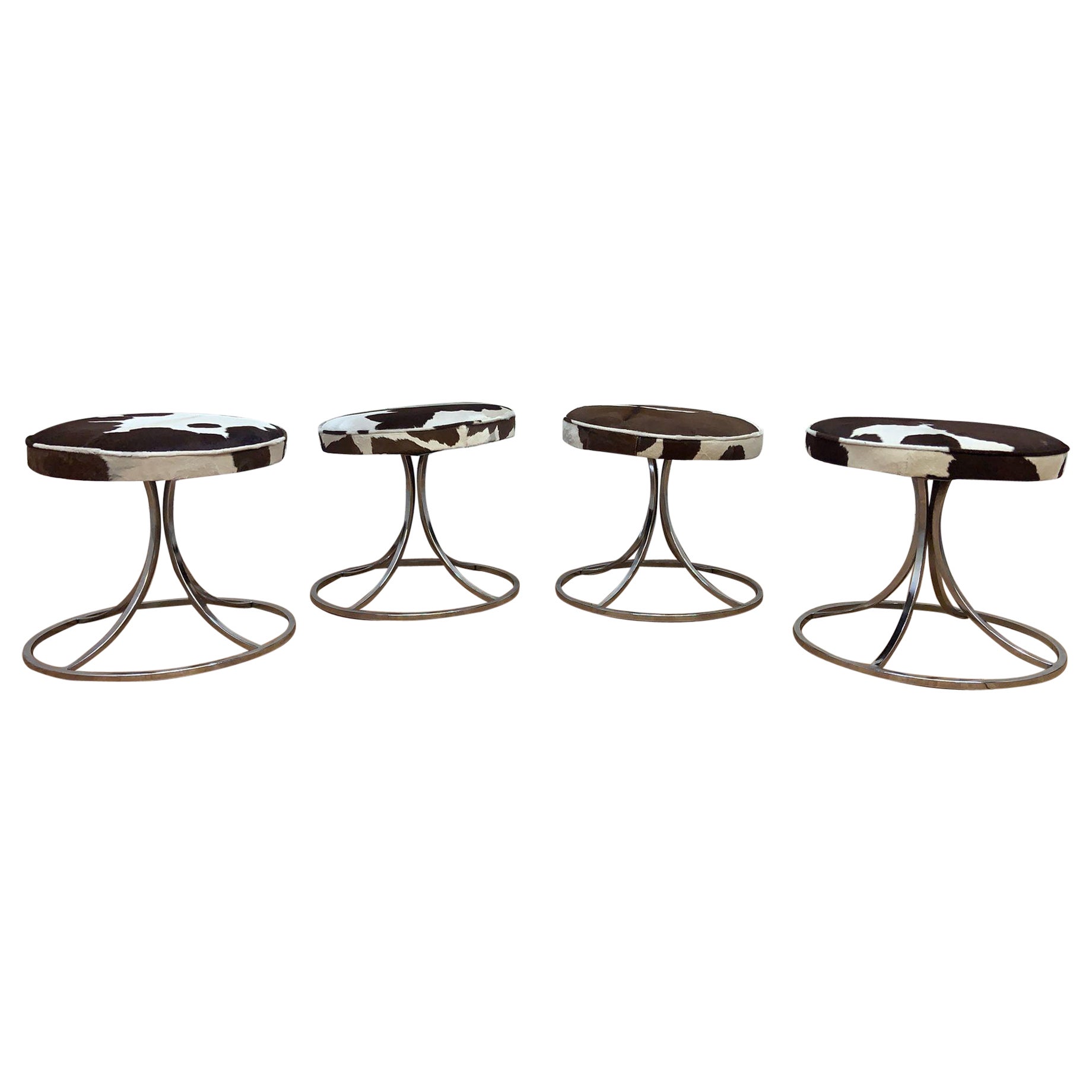 Avard Style Chrome Swivel Base Stools Newly Upholstered in Cowhide - Set of 4 For Sale