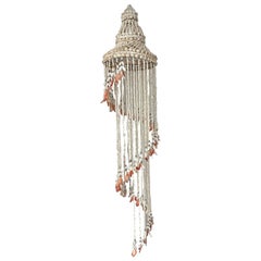 Vintage 1970/1980s tall chandelier in strings of natural shells