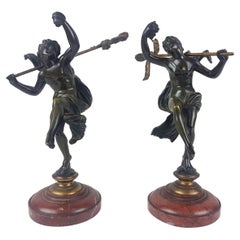 A pair of early  18th century bronzes