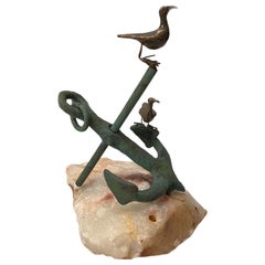 Sculpture signée Curtis Jere, datant des années 1970, représentant une ancre avec un oiseau sur des quarts.