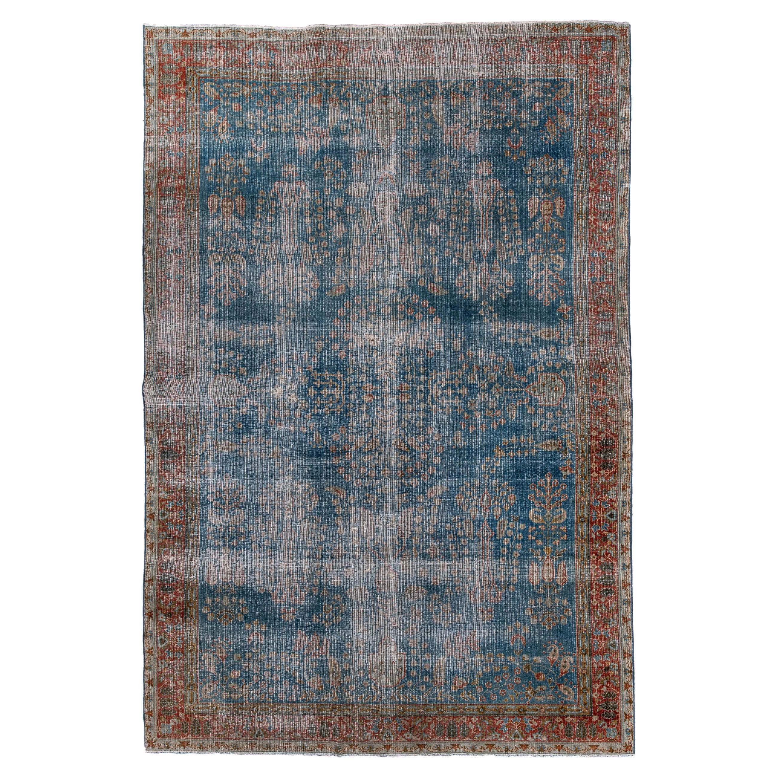 Distressed Kerman Rug with Royal Blue Field and Floral Design, Circa 1920's