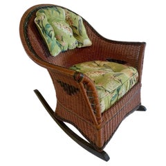 A Natural, Close Woven Wicker Rocker with Diamond Decoration