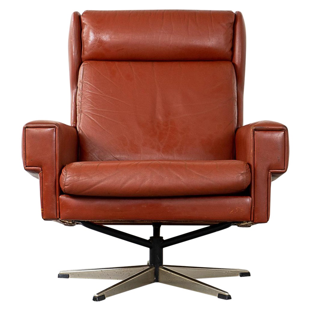 Mid-Century Rust Leather Swivel Chair For Sale