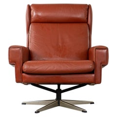 Mid-Century Rust Leather Swivel Chair