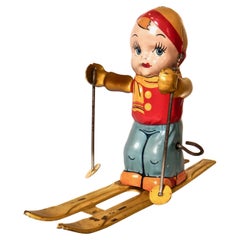 Antique Tin Wind Up Toy "Boy Skier" by J. Chein & Co. American Circa 1950