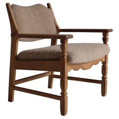 Chaise à accoudoirs en Oak Vintage par Henning Kjærnulf