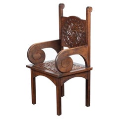 un important fauteuil sculpté en Oak Oak par Jacques PHILIPPE