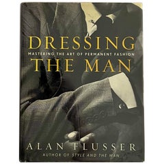 Dressing The Man: Mastering The Art of Permanent Fashion von Alan Flusser 2002