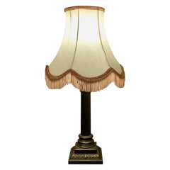 A Copper Effect Corinthian Column Table Lamp with Shade