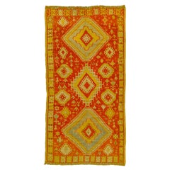 Vintage Berber carpet of old manufacture "Taznakht" red and saffron yellow field
