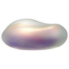 Moon-rock 010, clear glass sculptural rock with iridescent colours by Jon Lewis