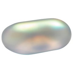 Moon-rock 013, clear glass sculptural rock with iridescent colours by Jon Lewis