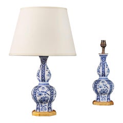 Pair of Small 19th Century Delft Blue and White Table Lamps with Giltwood Bases