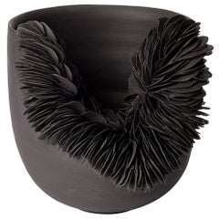 Black Collapsed Bowl, textured porcelain sculptural vessel by Olivia Walker