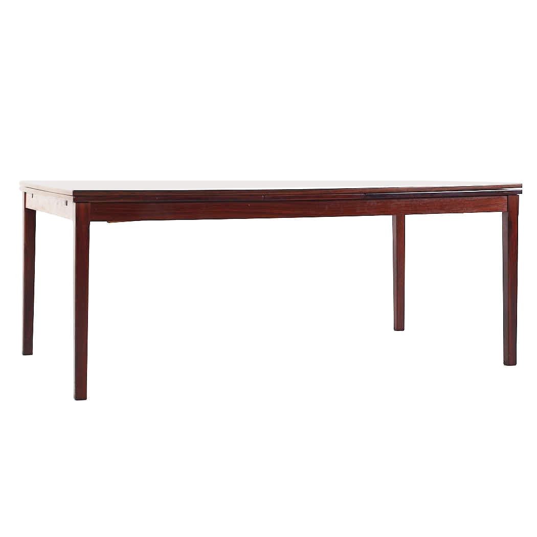 Johannes Andersen Style Mid Century Rosewood Hidden Leaf Dining Table For Sale