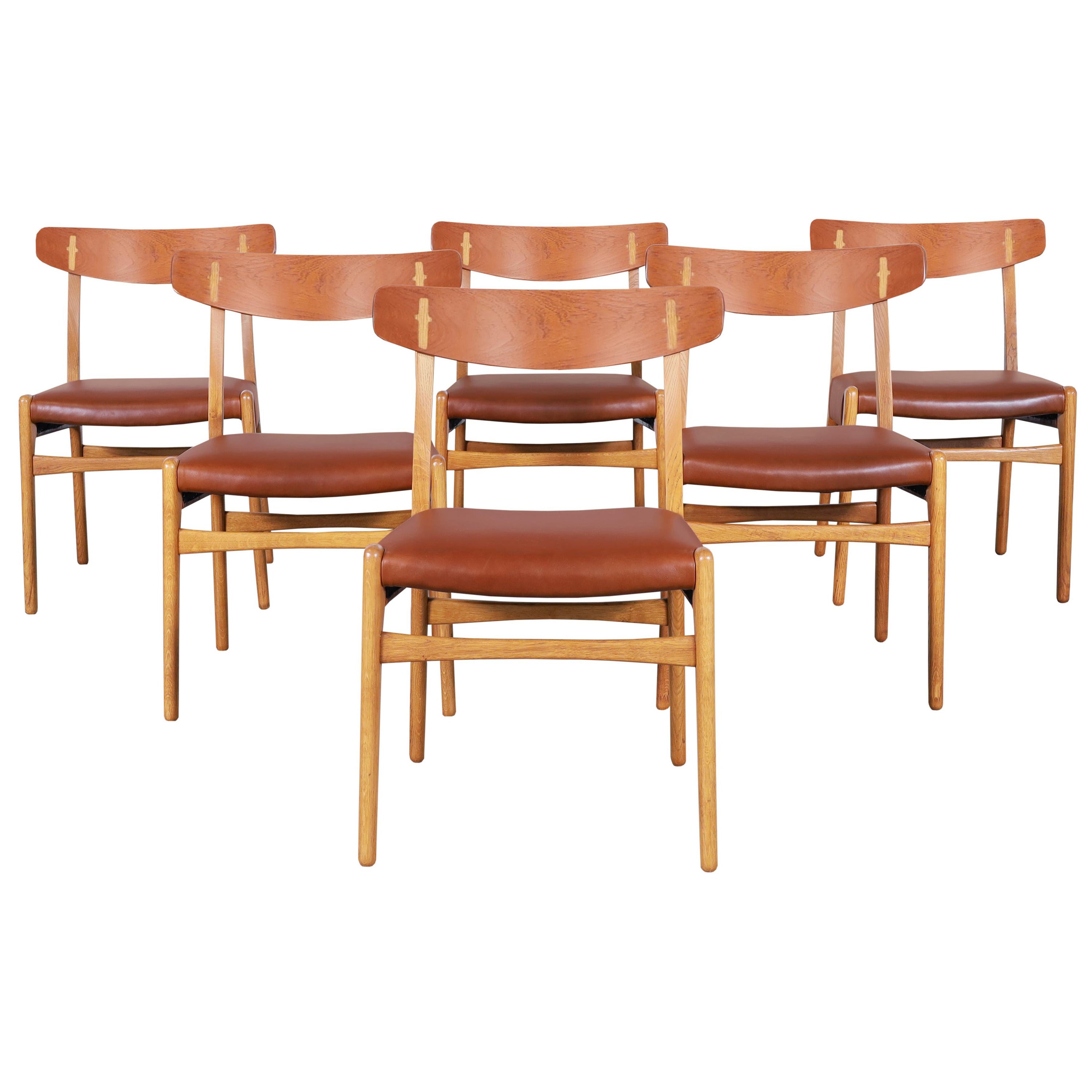 Chaises de salle à manger danoises modernes CH-23 en cuir par Hans J. Wegner en vente