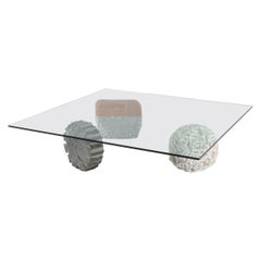 Vintage Center low table with sculptural stone feet and glass top - Casigliani Italy 80s