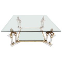 Lucite and brass coffee table with chinese temple guard sculptures, 1970s