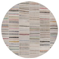 Rug & Kilim's Patchwork Kilim Circle Rug in Polychromatic Stripes (tapis circulaire en patchwork de Kilim à rayures polychromes)