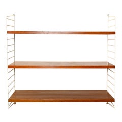 Wall-mounted bookcase with wooden shelves
