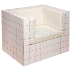 Fauteuil Club Tile, une chaise pivotante à carreaux mats avec tissu d'ameublement en fausse peau de mouton