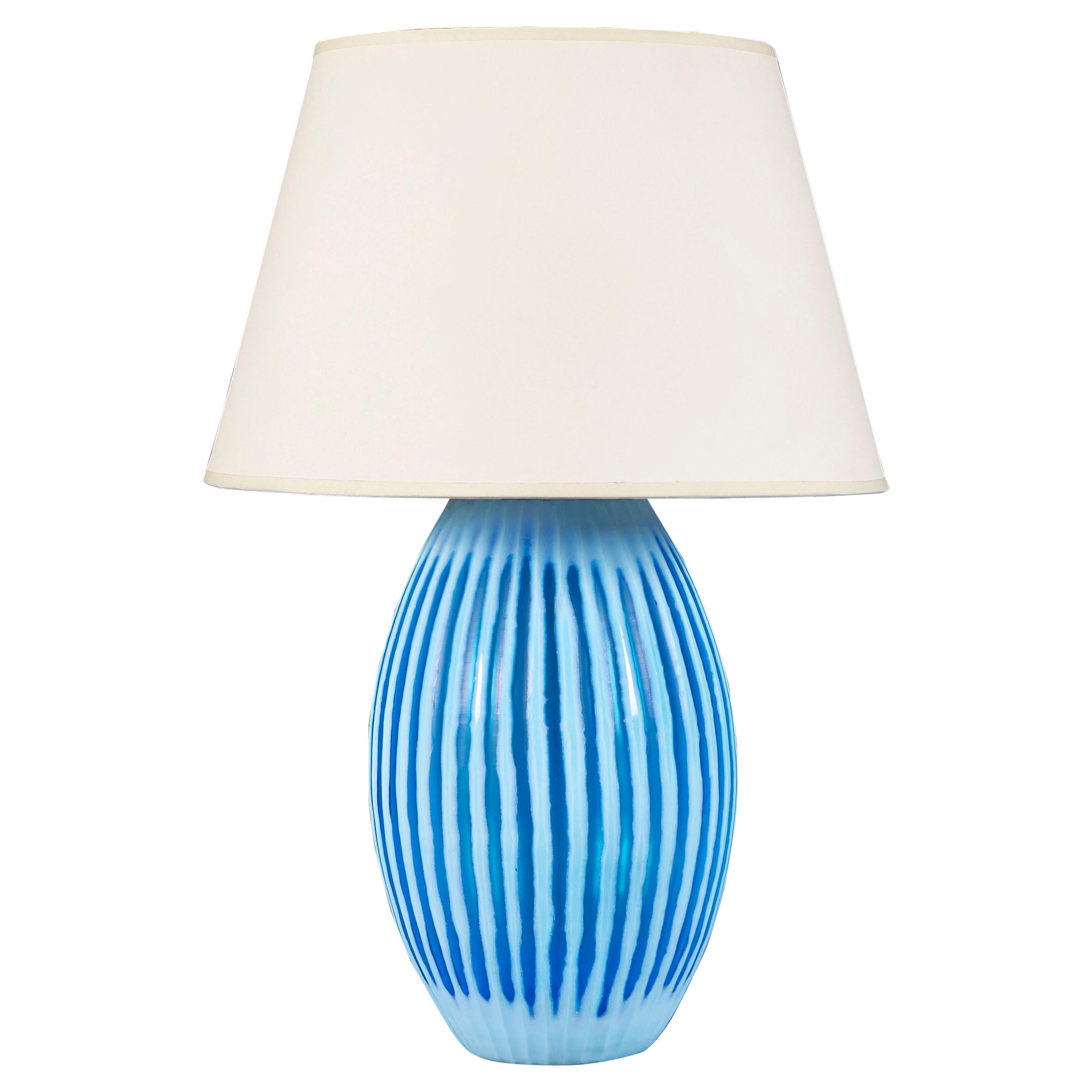A large blue gadrooned murano lamp