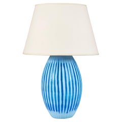 A large blue gadrooned murano lamp