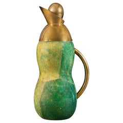 An unusual green vellum and brass flask 