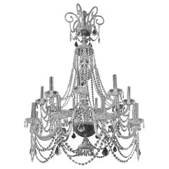 A large George III style cut glass chandelier, circa 1920