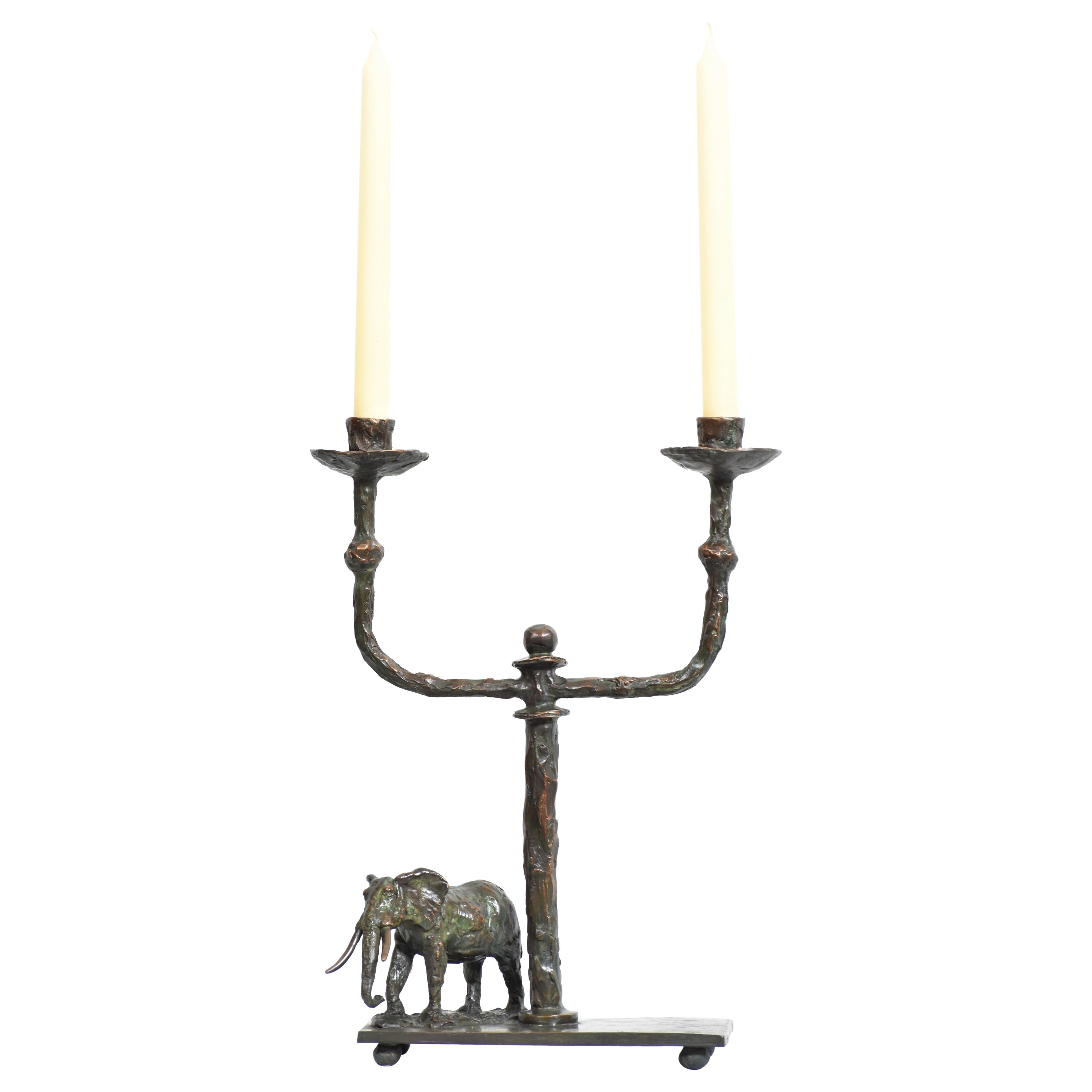 Elephant Candelabra in cast bronze featuring bronze sculpture of elephant bull