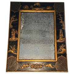 Lacquered Mirror with Chinese Scenes in the style of Maison Jansen. Circa 1940