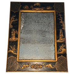 Lacquered Mirror with Chinese Scenes in the style of Maison Jansen. Circa 1940