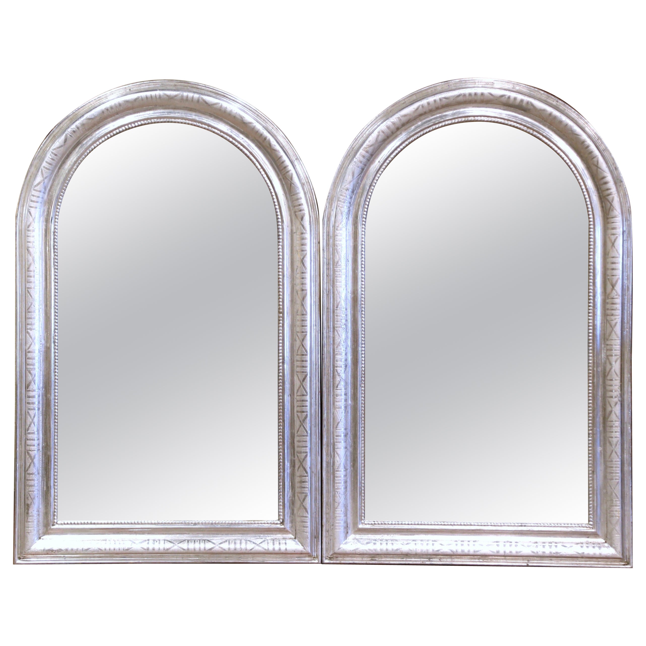 Pair of French Louis Philippe Silver Leaf Wall Mirrors with Engraved Motifs