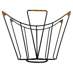 Vintage Sculptural 1950s metal magazine rack with twisted rattan details Laurids Lonborg