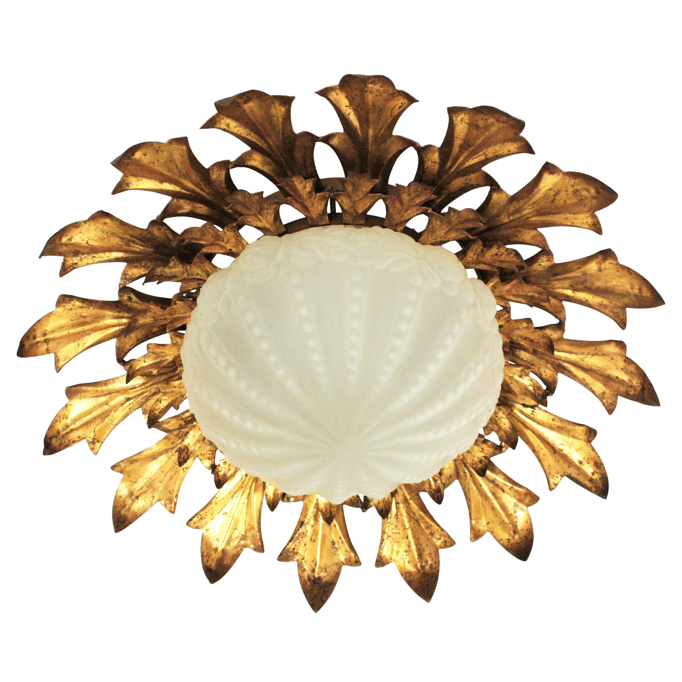 Large Sunburst Flush Mount in Gilt Iron with Frosted Glass Globe For Sale