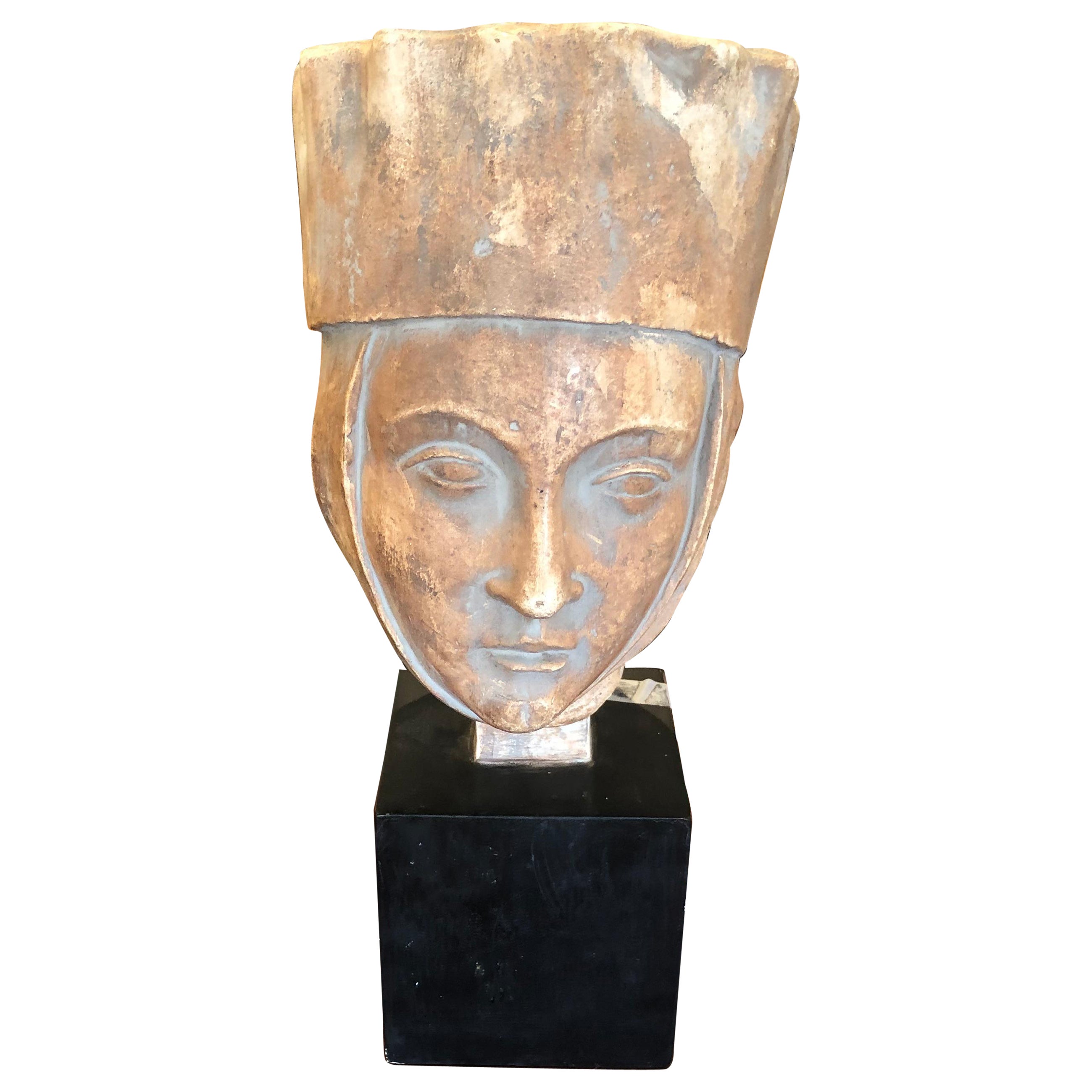 Striking Female Bust of Saint or Princess on Black Cube