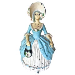 Tope de puerta de hierro fundido "Mujer colonial" Americano, Circa 1930