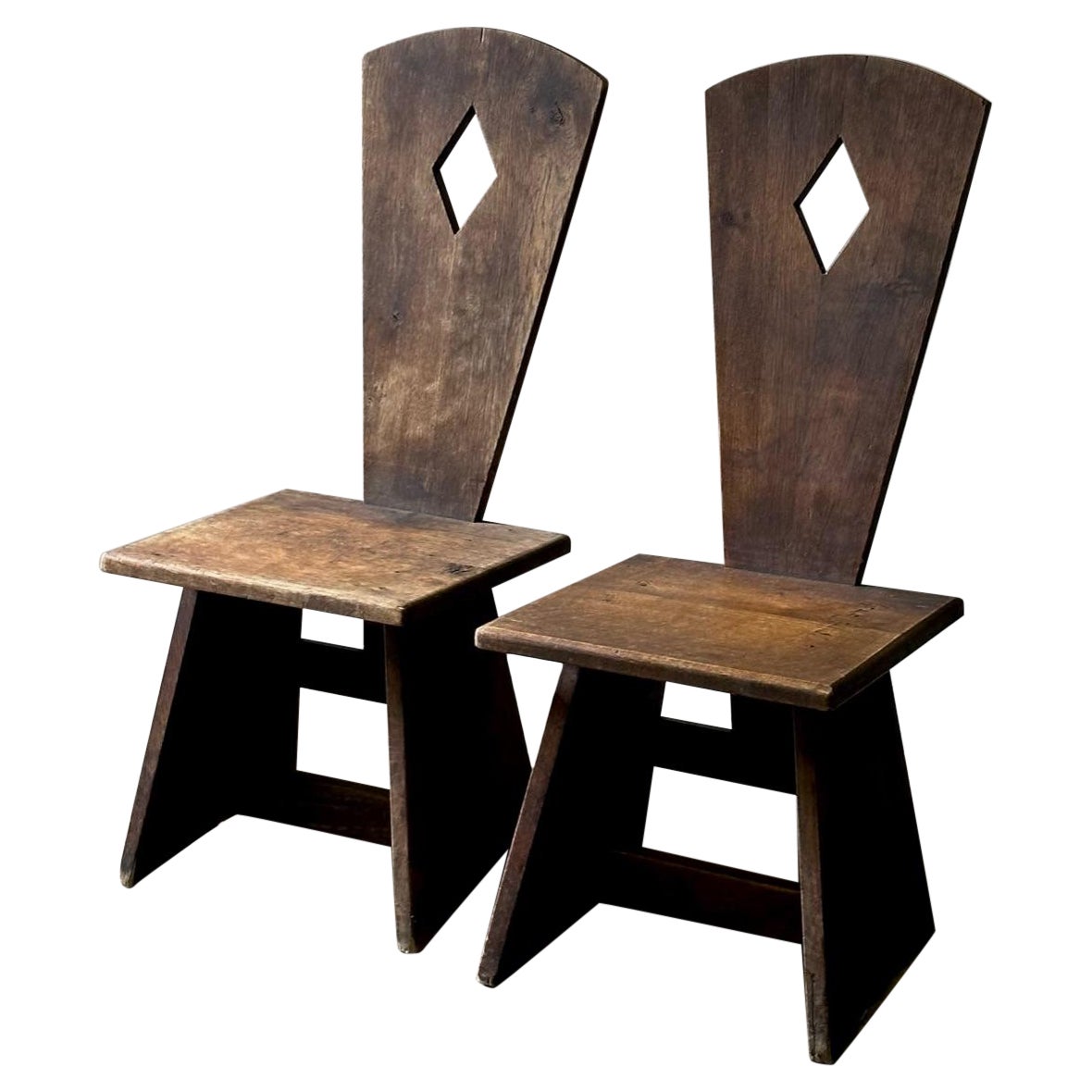 Pair of Early 20th Century French Low Rustic Oak Chairs For Sale