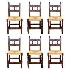 Antique 20th Century Set of Six Catalan Chairs in Carved Walnut and Caned Seats