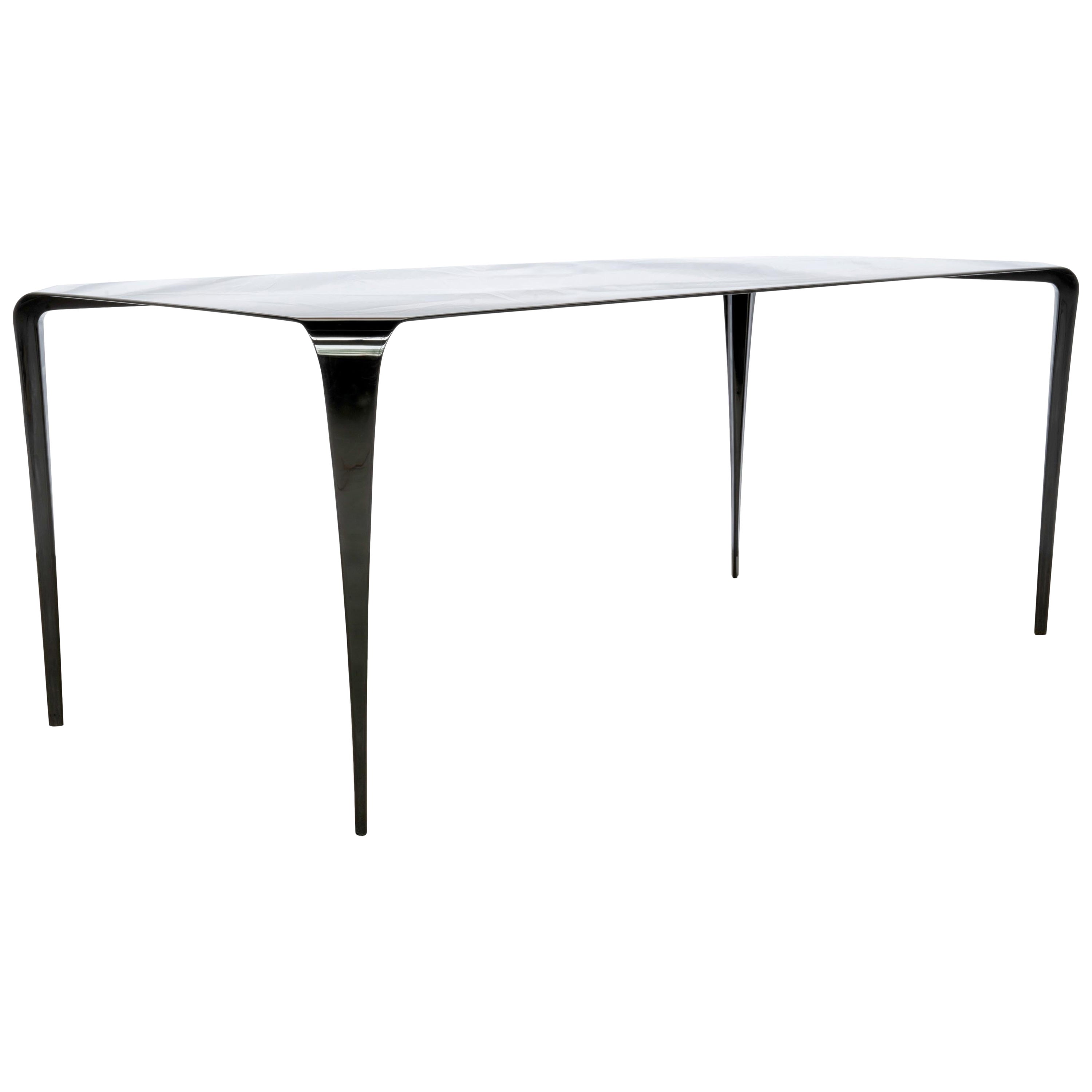 FLO - Metal dining room table with stiletto legs and custom finishes