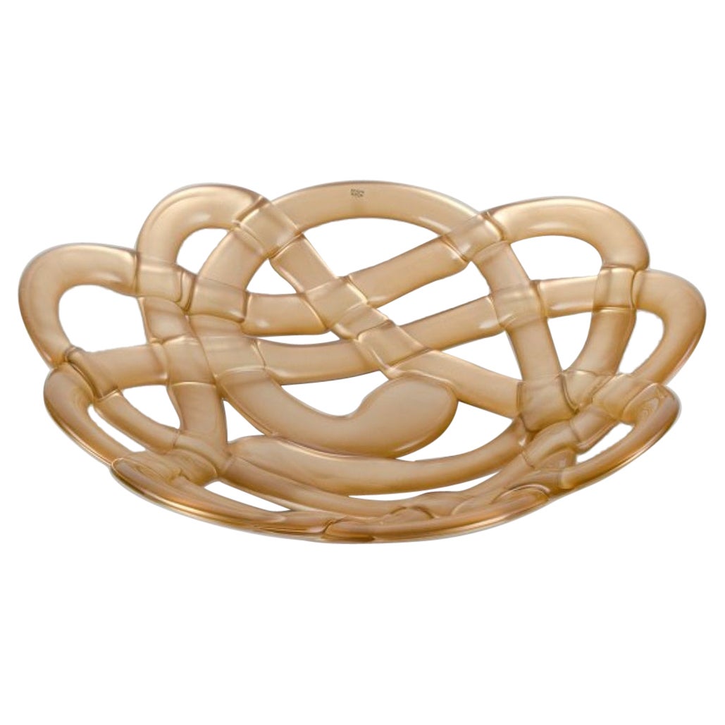 Anna Ehrner for Kosta Boda.  "Basket" bowl in gold and clear art glass. For Sale