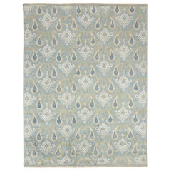 Rug & Kilim’s Classic Ikats Style Rug with Gold, White and Blue Patterns