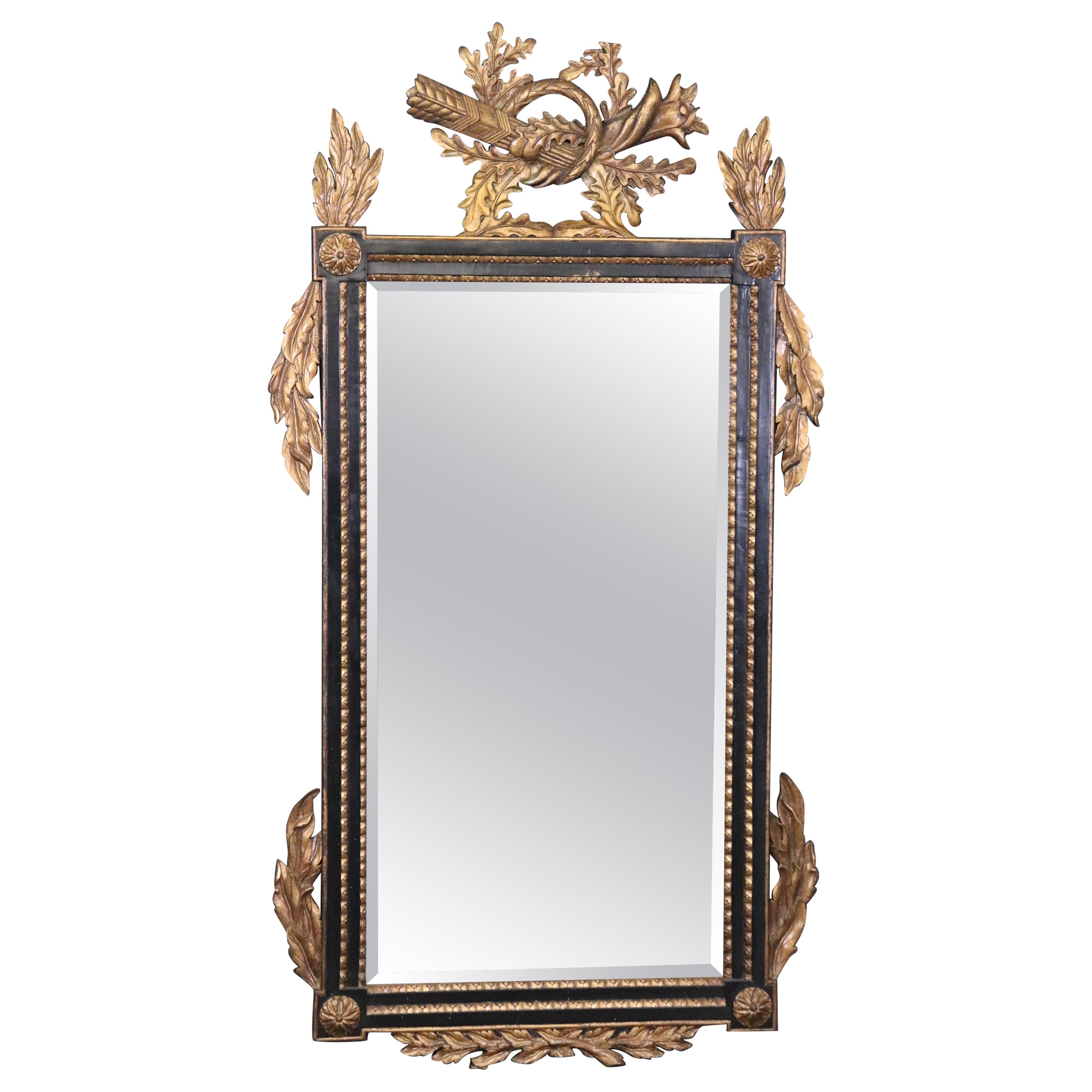 Regency Style Ebonized and Gilt Carved Floral Wall Hanging Mirror For Sale