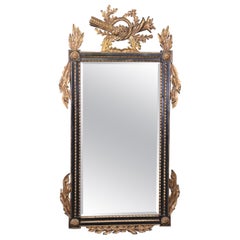 Regency Style Ebonized and Gilt Carved Floral Wall Hanging Mirror