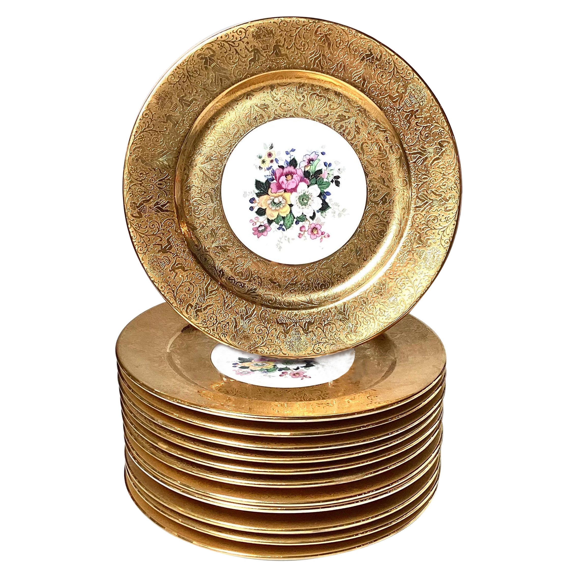 A Set of 12 Lavish Gold Floral Service Cabinet Plates For Sale