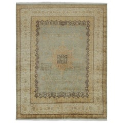 Rug & Kilim’s Mohtasham Style Rug in Blue with Gold Medallion and Beige Florals