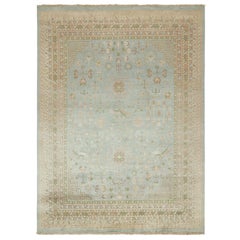 Rug & Kilim’s Khotan Style Rug with Blue, Gold and Green Floral Pattern