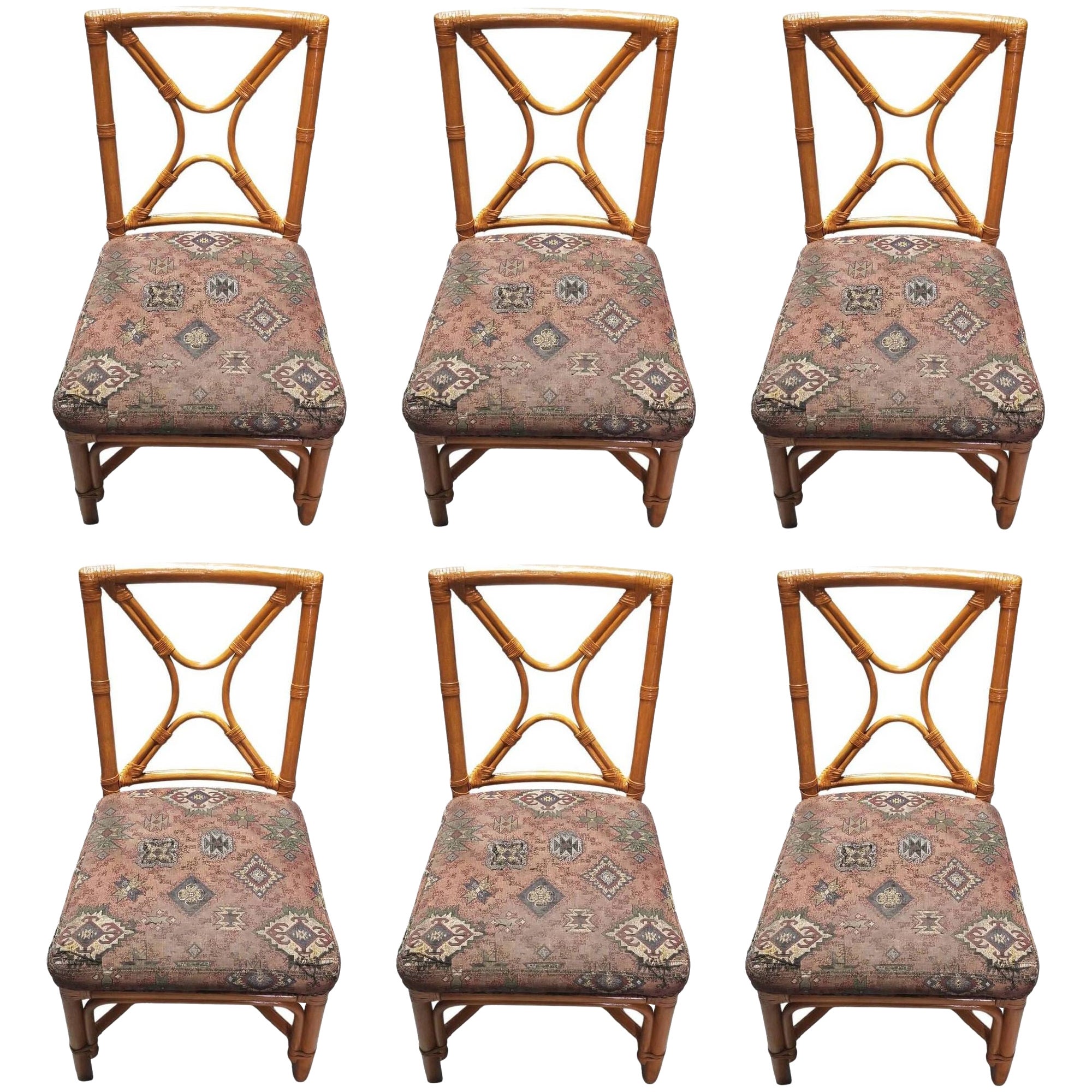 Restored Rattan set of 6 Dining Chairs Featuring X-back and Leather Wrappings. For Sale