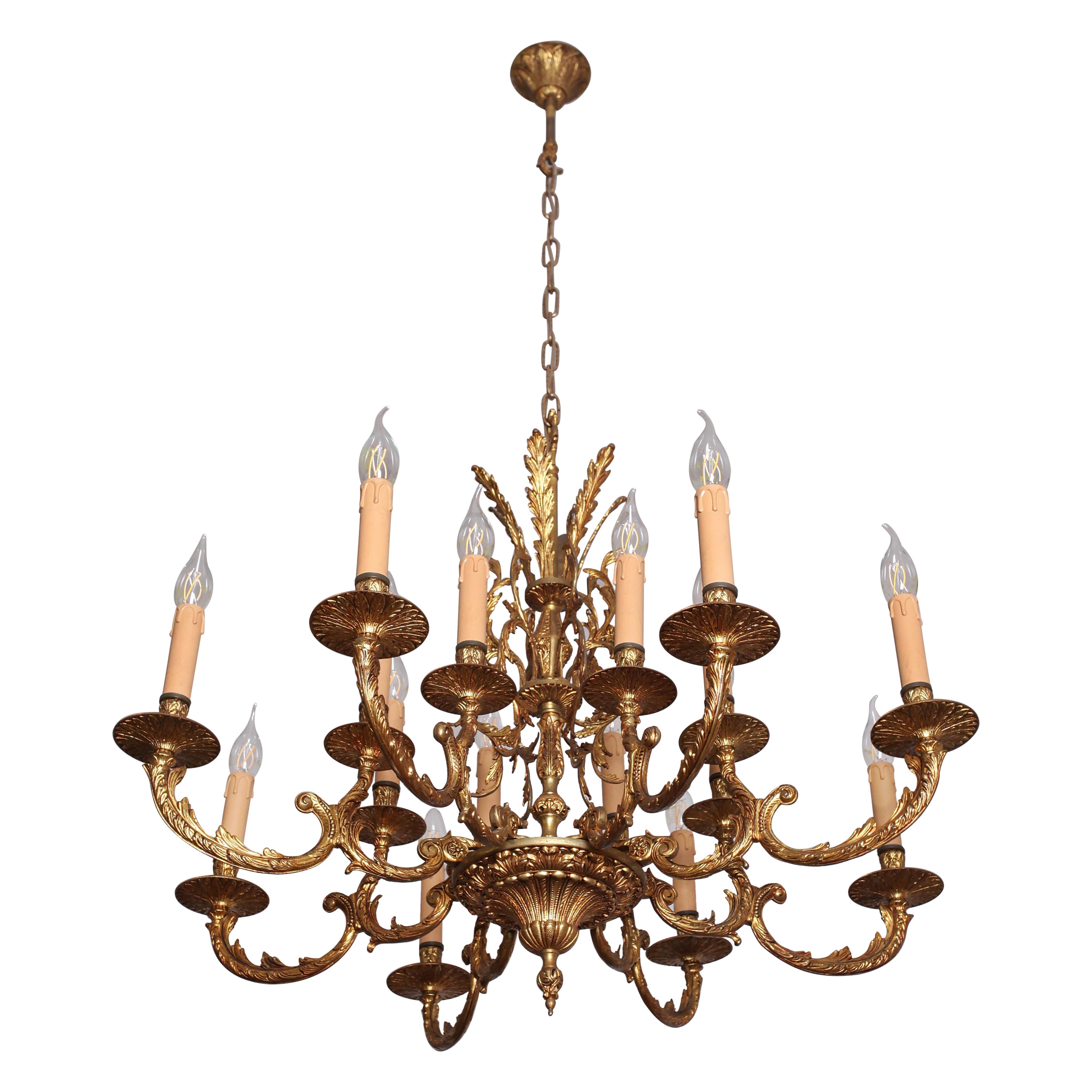 Rococo chandelier made of polished brass 16 bulbs For Sale